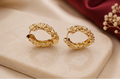 Women's chunky gold irregular molten textured huggie hoop earrings