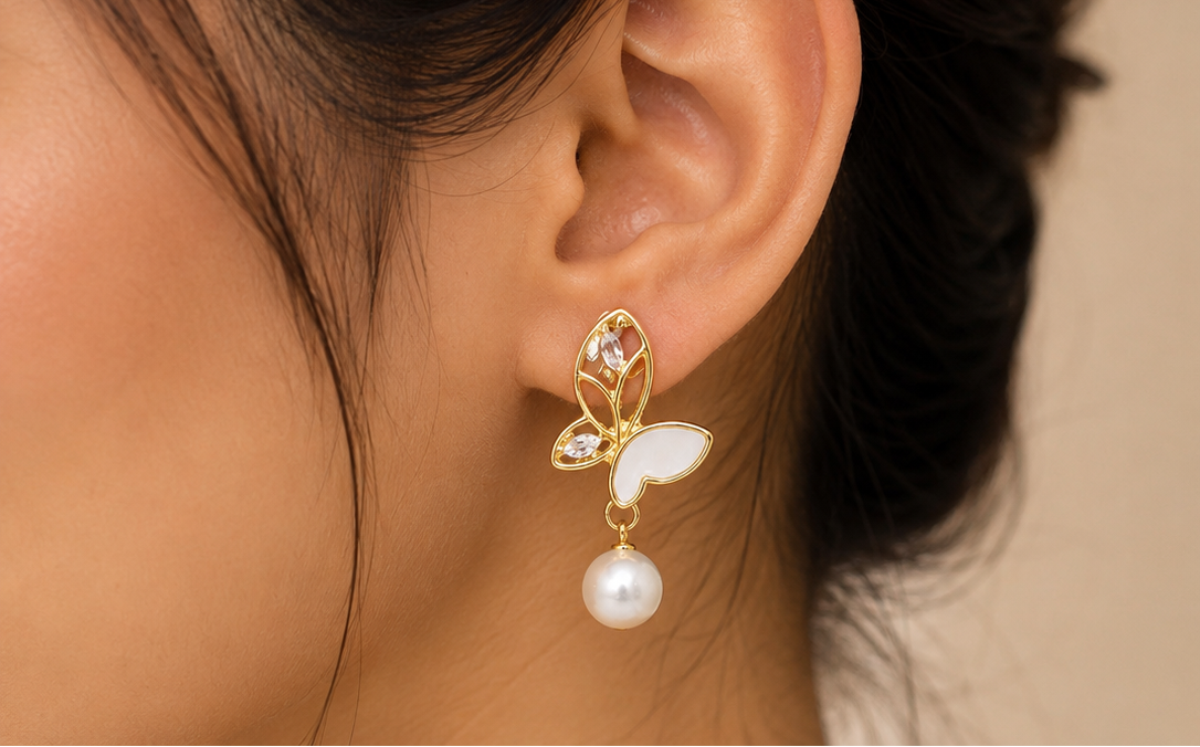 Butterfly enamel and pearl drop earrings
