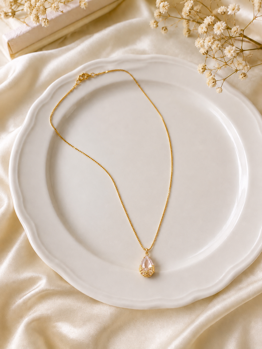 Gold-plated faux emerald teardrop pendant necklace
