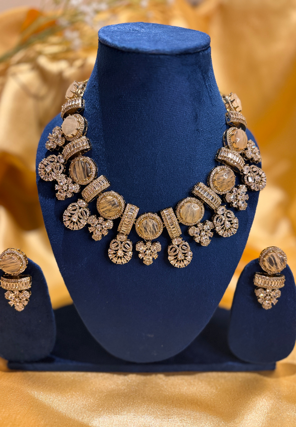 Golden statement piece with doublet stone and AD stone work