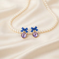 Cobalt Blue Bow & Purple Crystal Drop Earrings