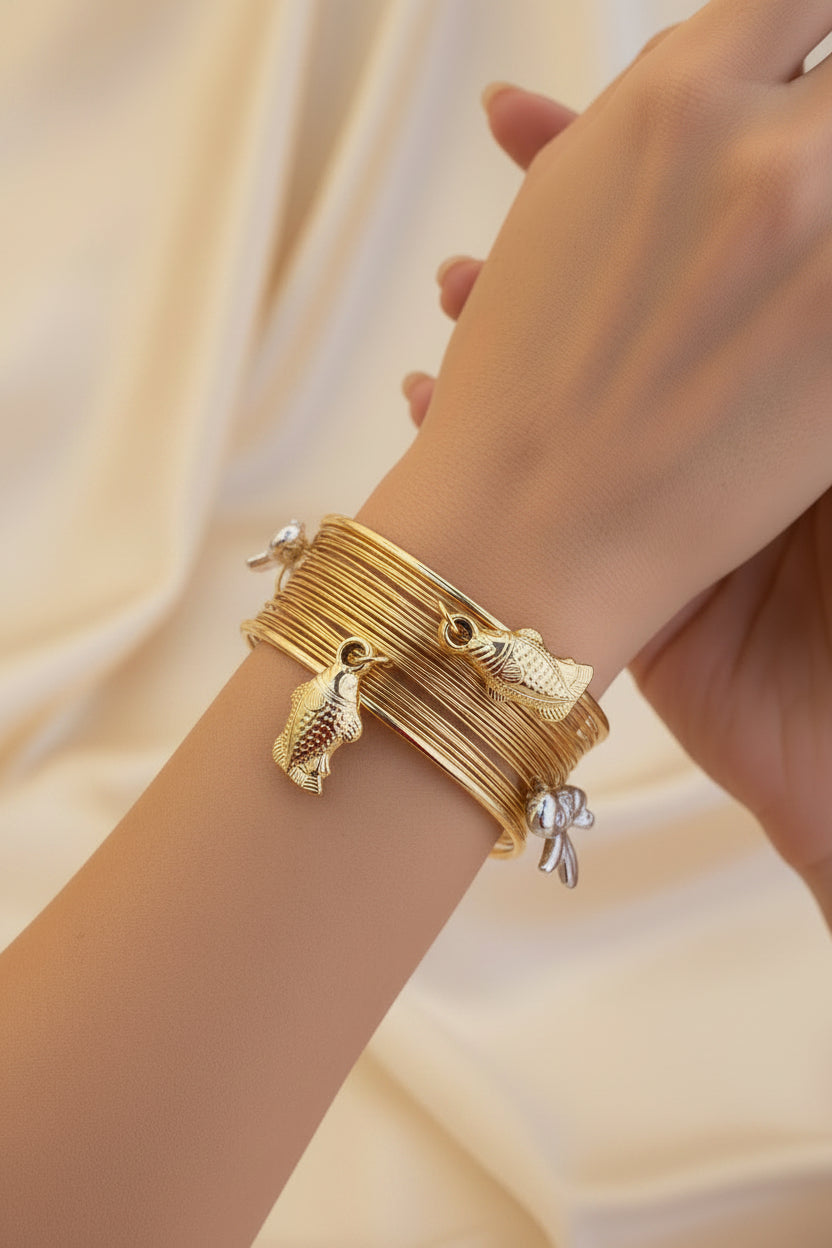 Multi-Wire Pearl And Fish Charm Cuff