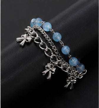 Coquette-inspired multi-layered charm bracelet