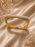AD contemporary, geometric square-profile statement kada bangle