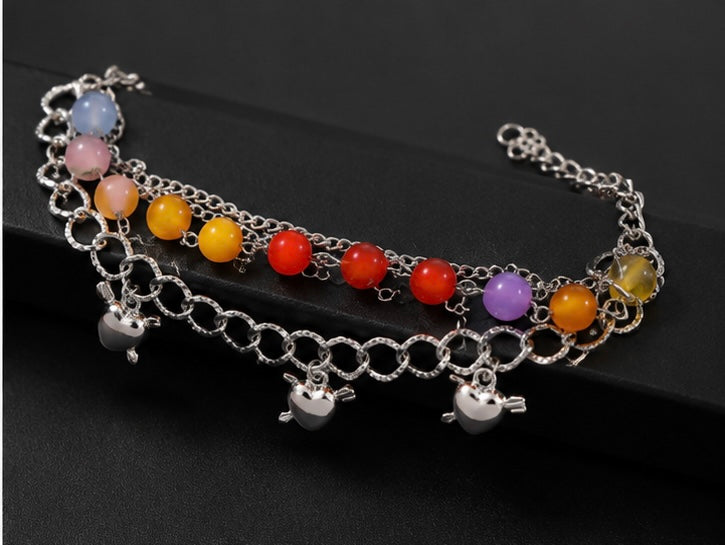 Vibrant multi-layered charm bracelet