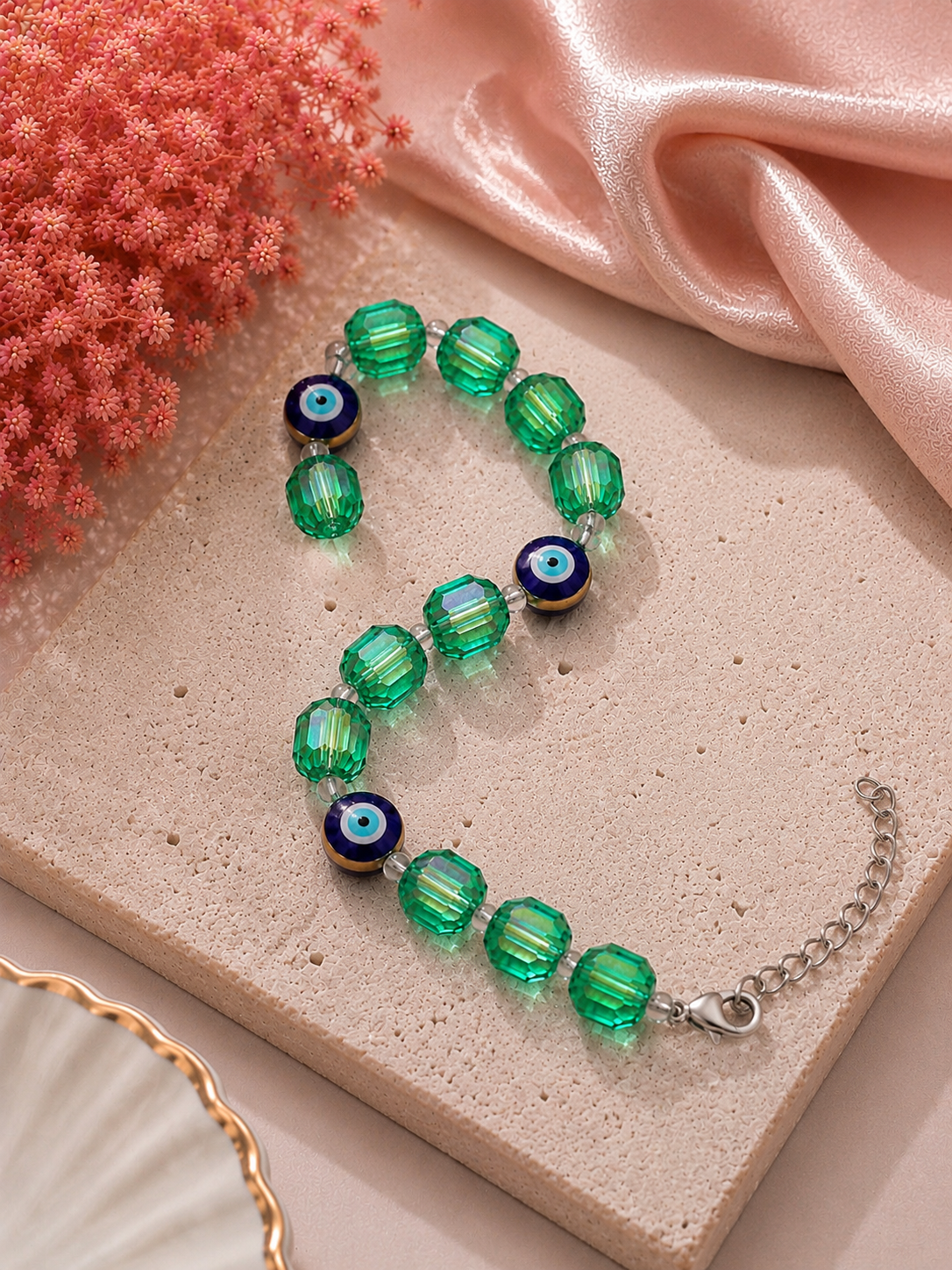 Iridescent green crystal and evil eye bead bracelet