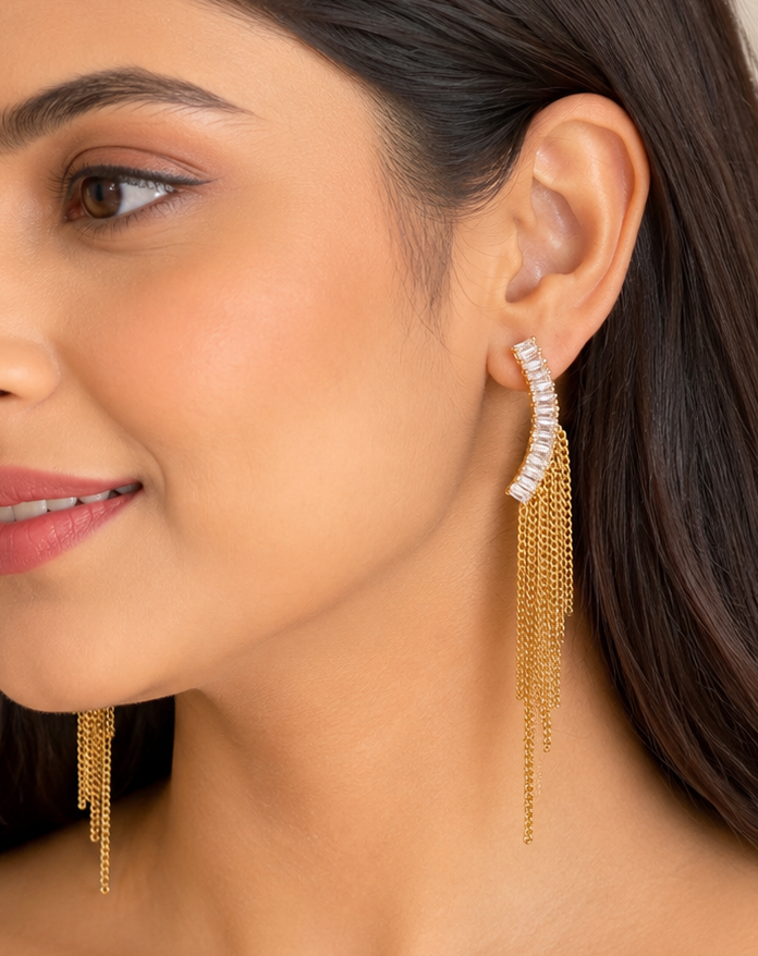 Women's gold crystal ear climber chain tassel drop earrings.
