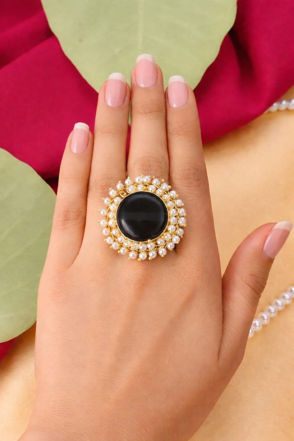 Gold-Plated Circular Stone Cocktail Ring with Pearl Border Accent.