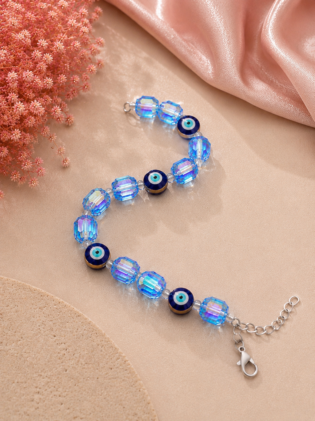 Iridescent light blue crystal and evil eye bead bracelet