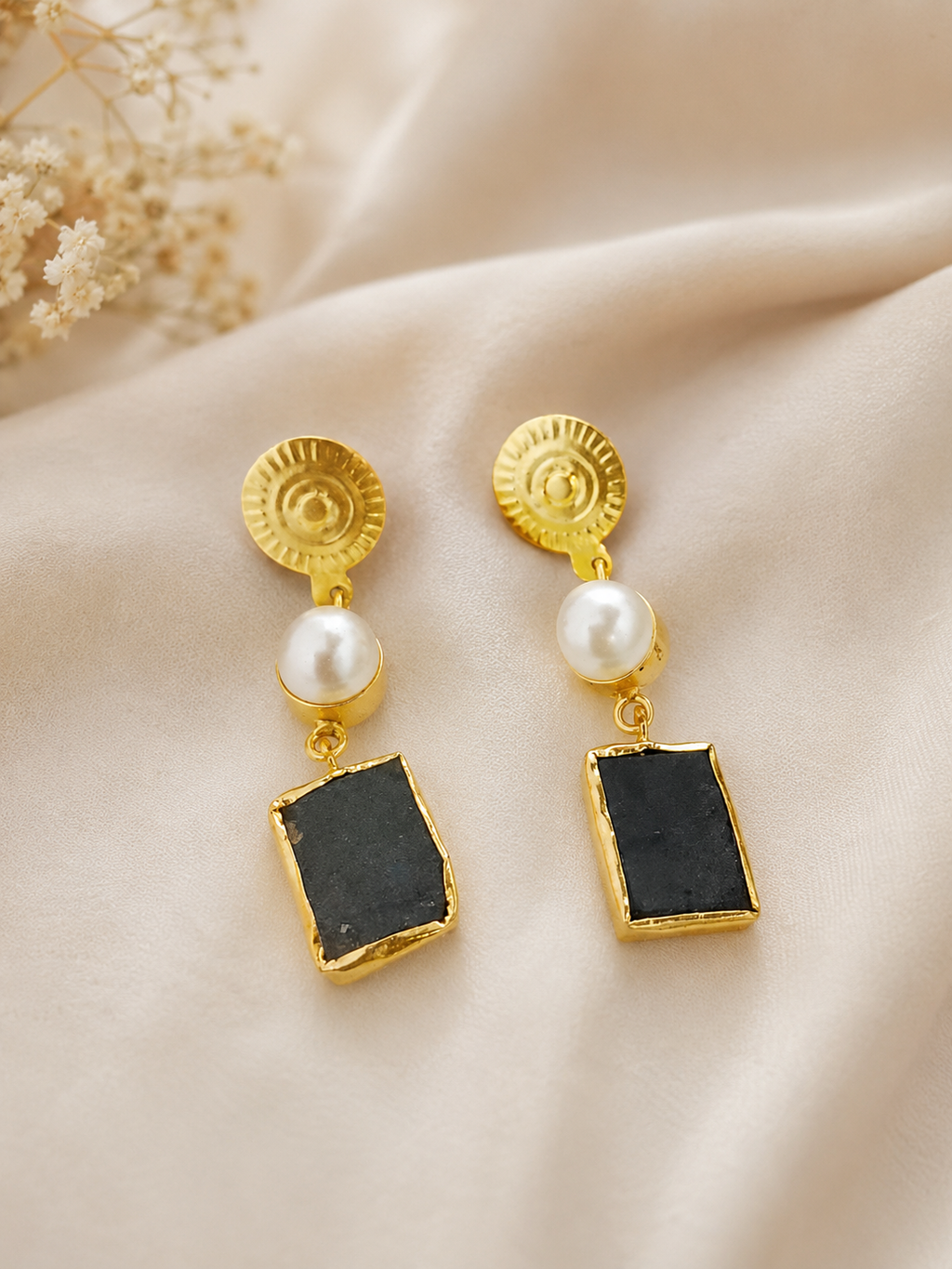 Brass pearl earring with uncut green stone