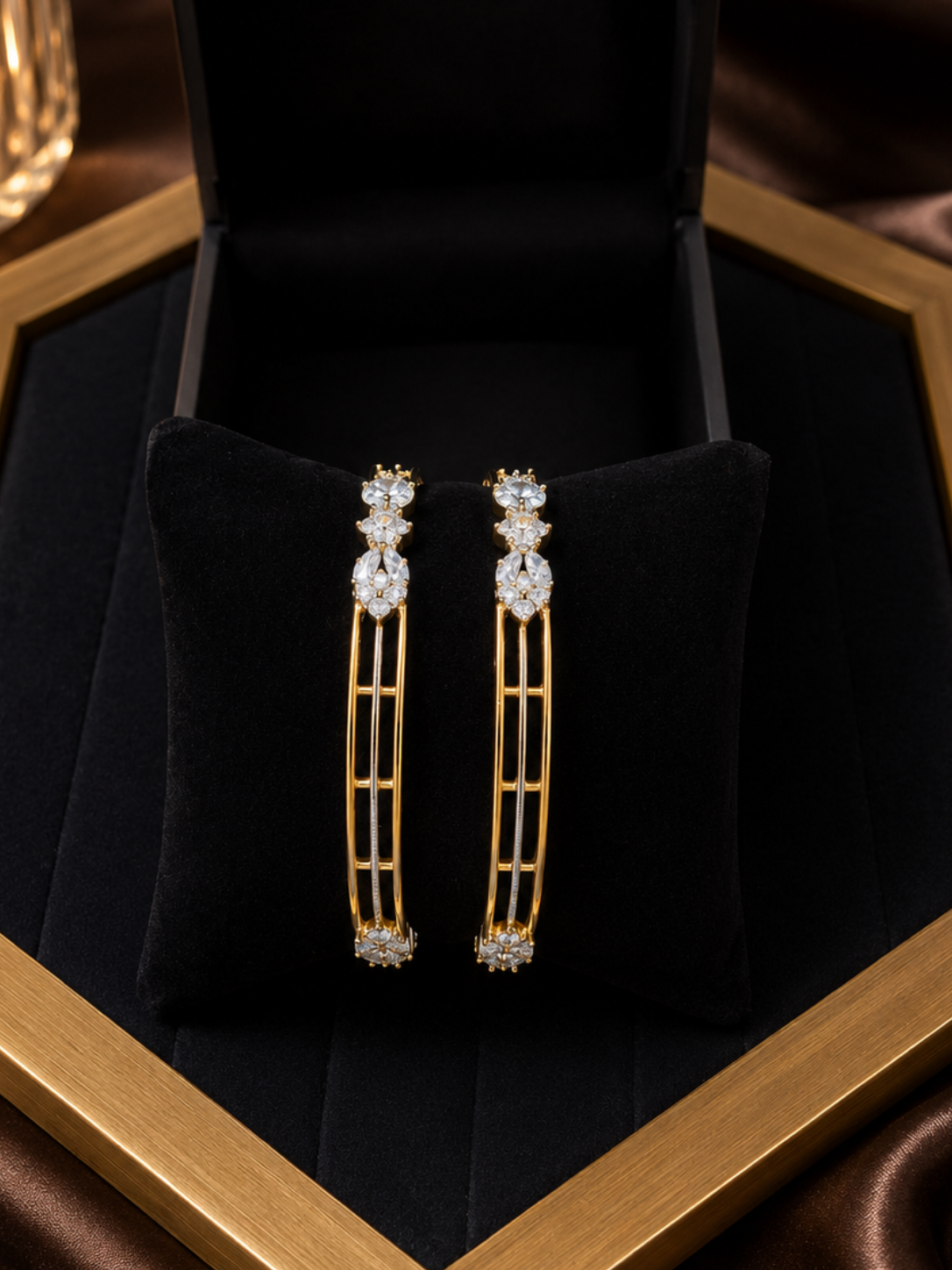 Alluring pair of gold-plated triple-strand American Diamond bangles