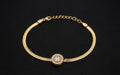 Gold herringbone snake chain charm bracelet