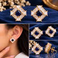 Princess and baguette cut geometric diamond stud earrings