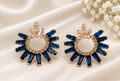 Sapphire blue crystal starburst earrings