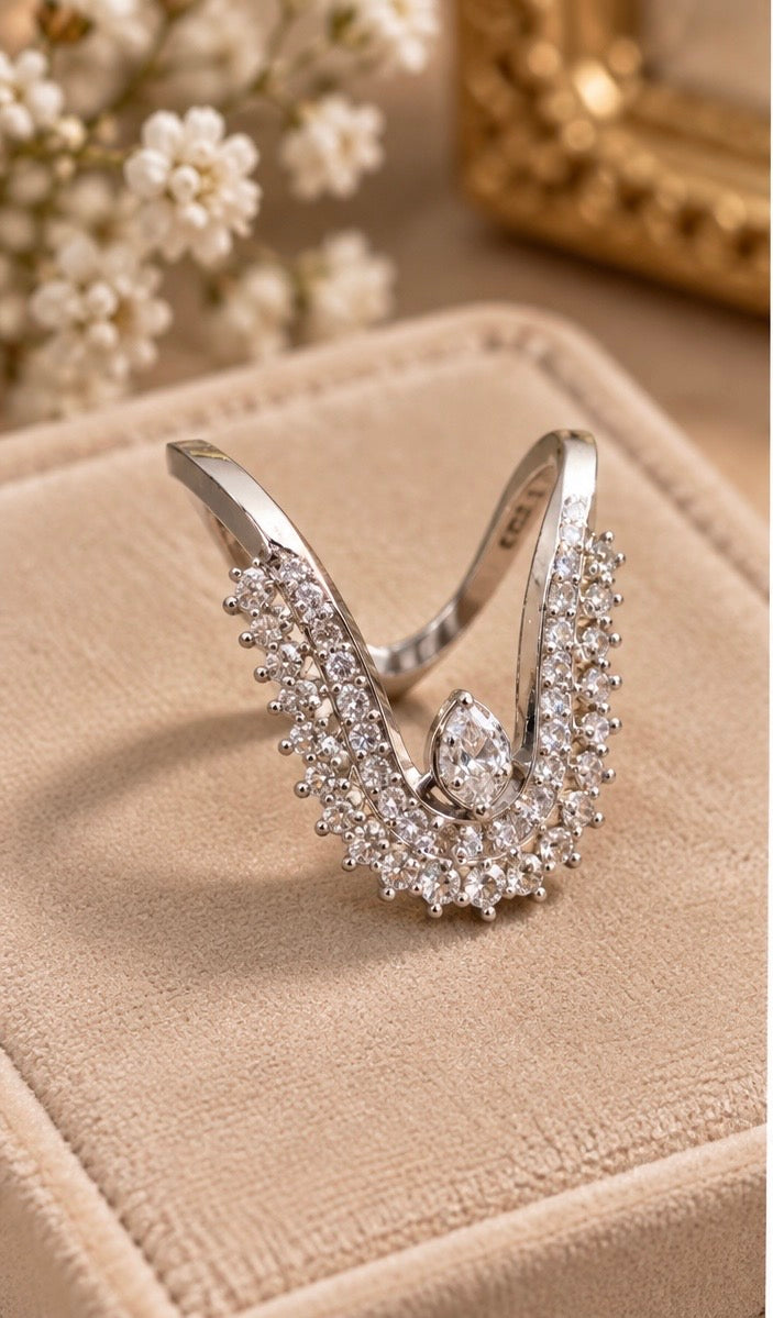 Curved chevron tiara ring