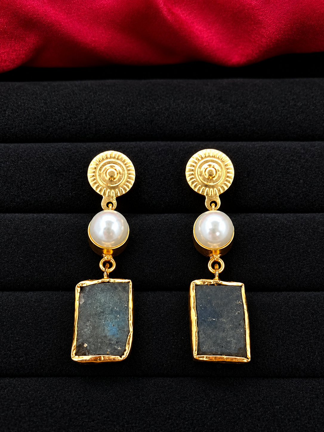 Brass pearl earring with uncut green stone