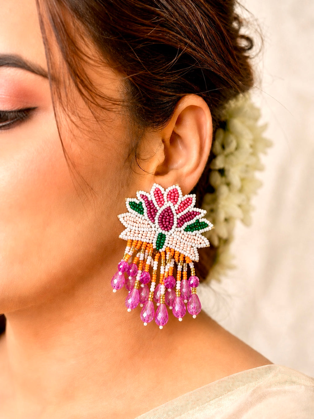 Handcrafted pink and white beaded lotus earrings