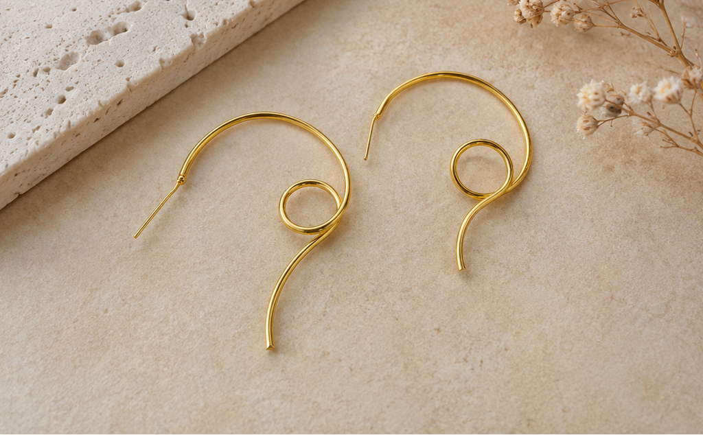 Gold-plated spiral swirl hoop earrings