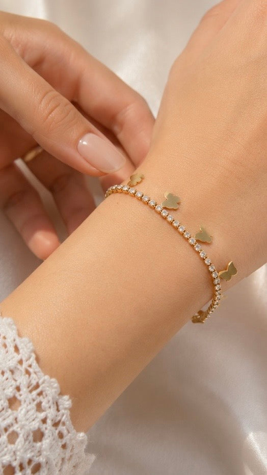 Whimsical gold-plated butterfly tennis charm bracelet