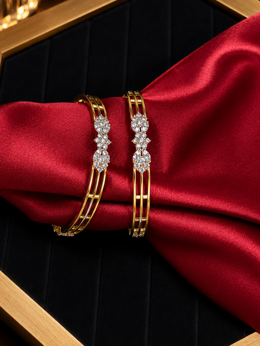 Alluring pair of gold-plated triple-strand American Diamond bangles