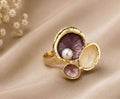 French-vintage style gold enamel lotus pod and pearl cocktail ring