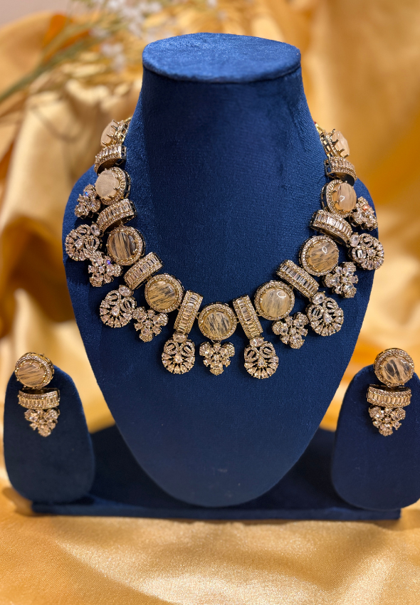 Golden statement piece with doublet stone and AD stone work
