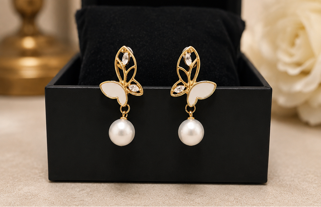 Butterfly enamel and pearl drop earrings