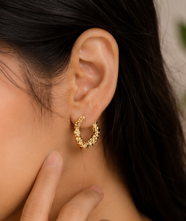 Women's chunky gold irregular molten textured huggie hoop earrings