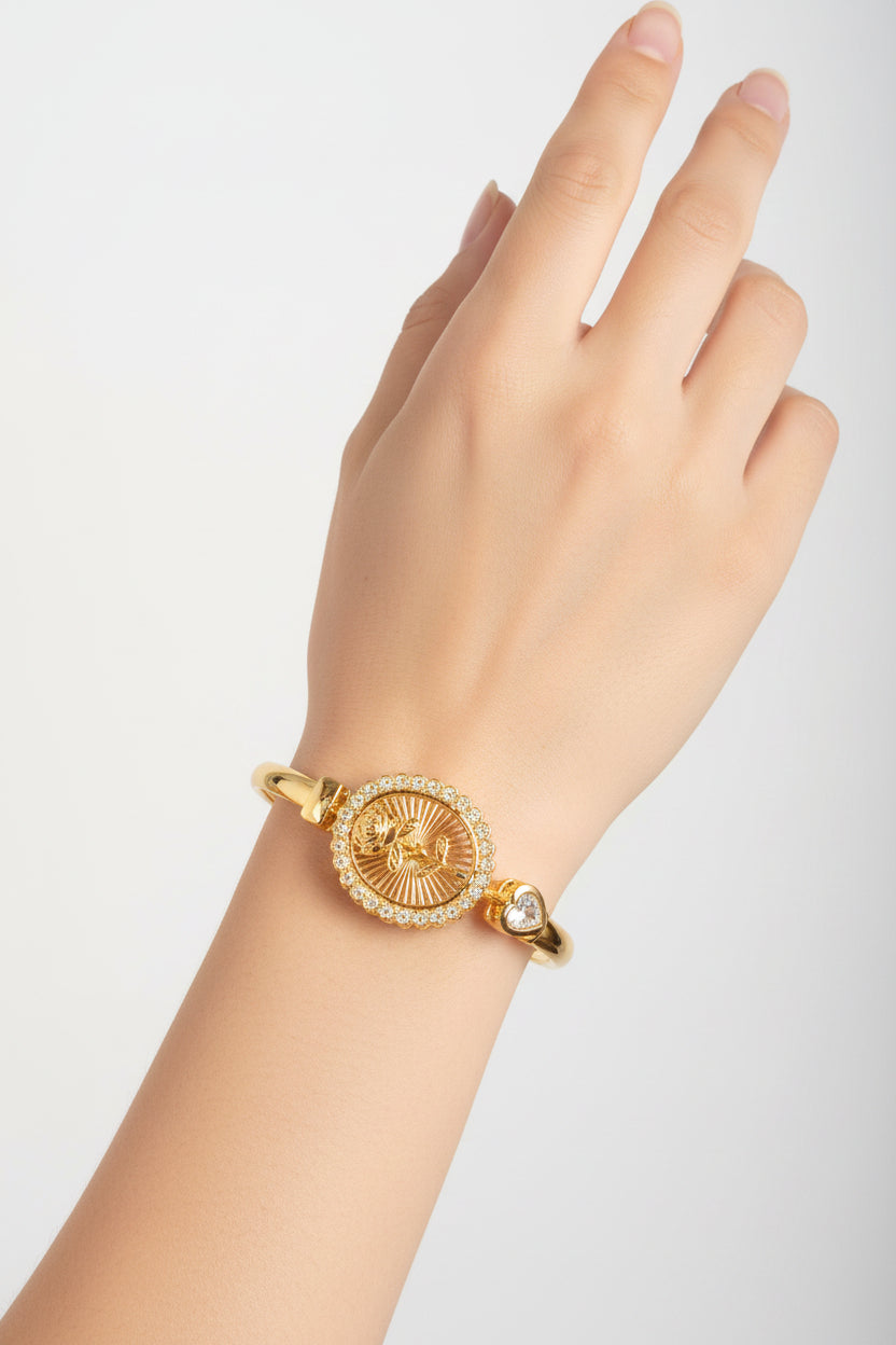 Gold-Plated Virgin Mary Oval Medallion Bangle with Cubic Zirconia Border