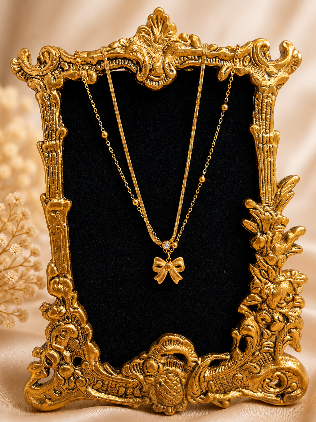 Layered Bow and Beaded Charm Necklace.