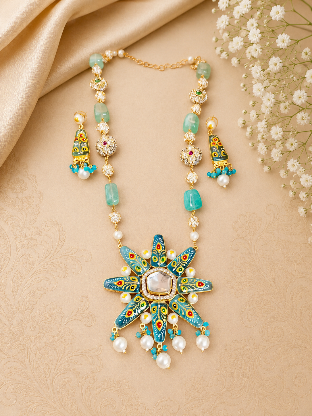 Handcrafted turquoise-blue Meenakari and Kundan star pendant necklace set with matching earrings
