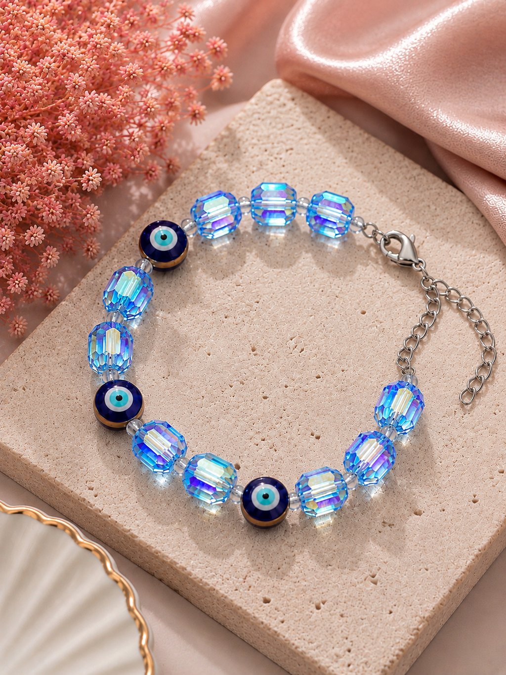 Iridescent light blue crystal and evil eye bead bracelet