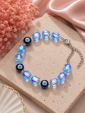 Iridescent light blue crystal and evil eye bead bracelet