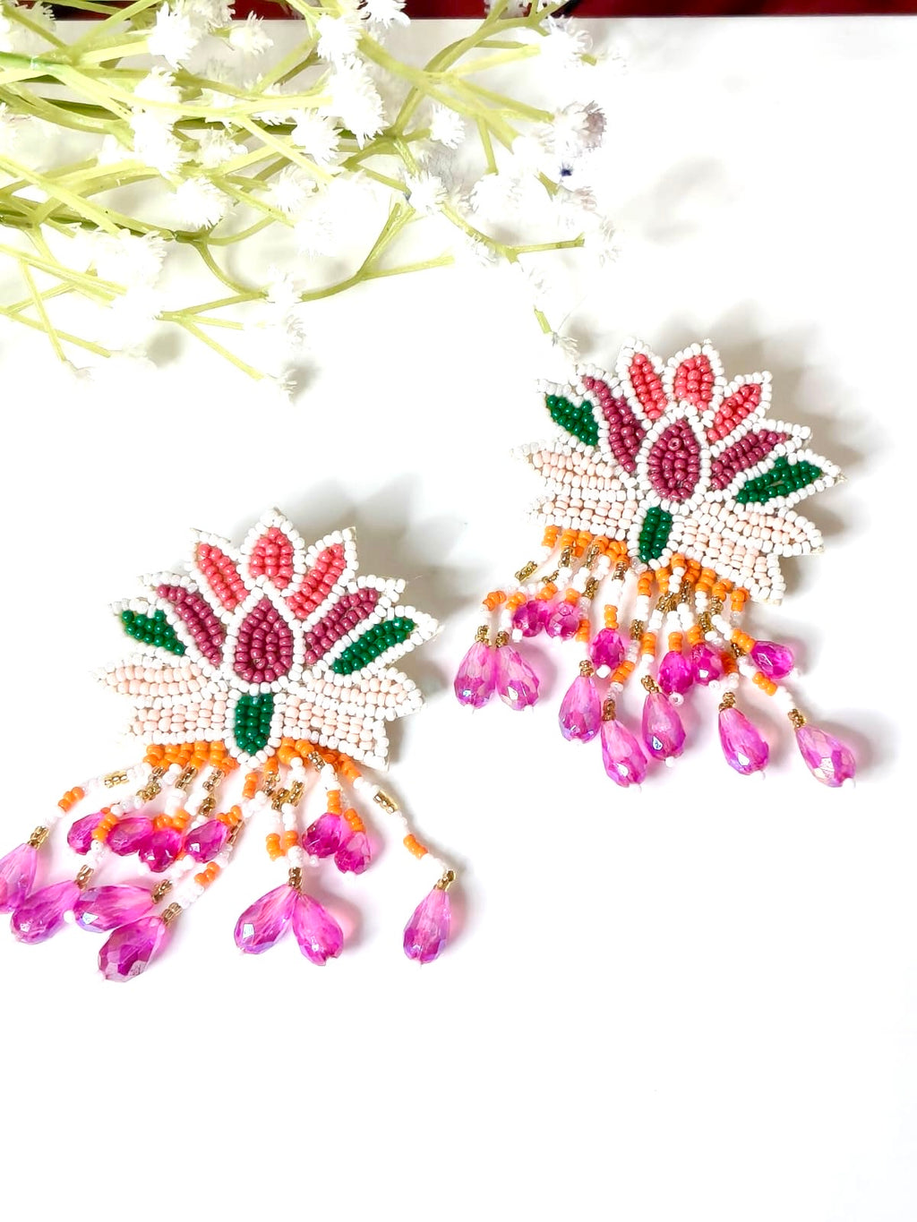 Handcrafted pink and white beaded lotus earrings