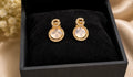 Korean-style "G-letter" opal studs