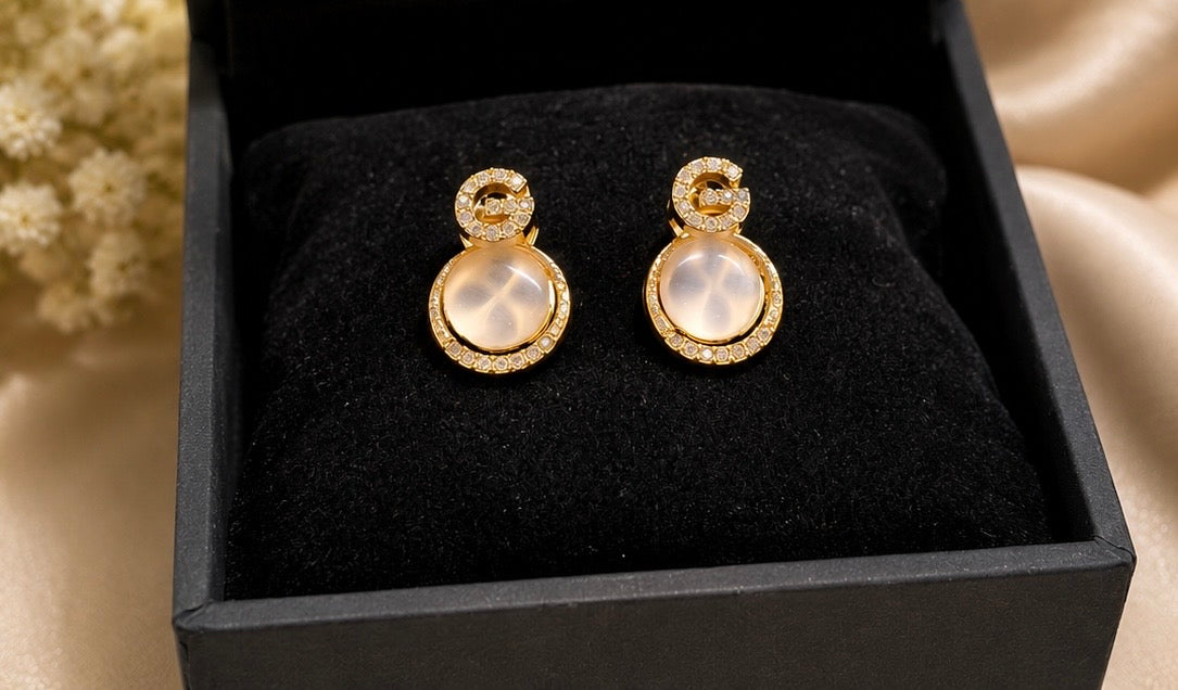 Korean-style "G-letter" opal studs