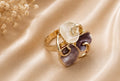 French-vintage style gold enamel swirling petal cluster cocktail ring
