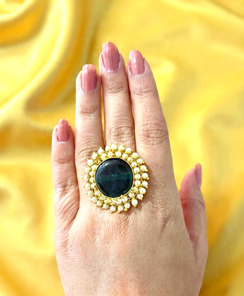 Gold-Plated Circular Stone Cocktail Ring with Pearl Border Accent.