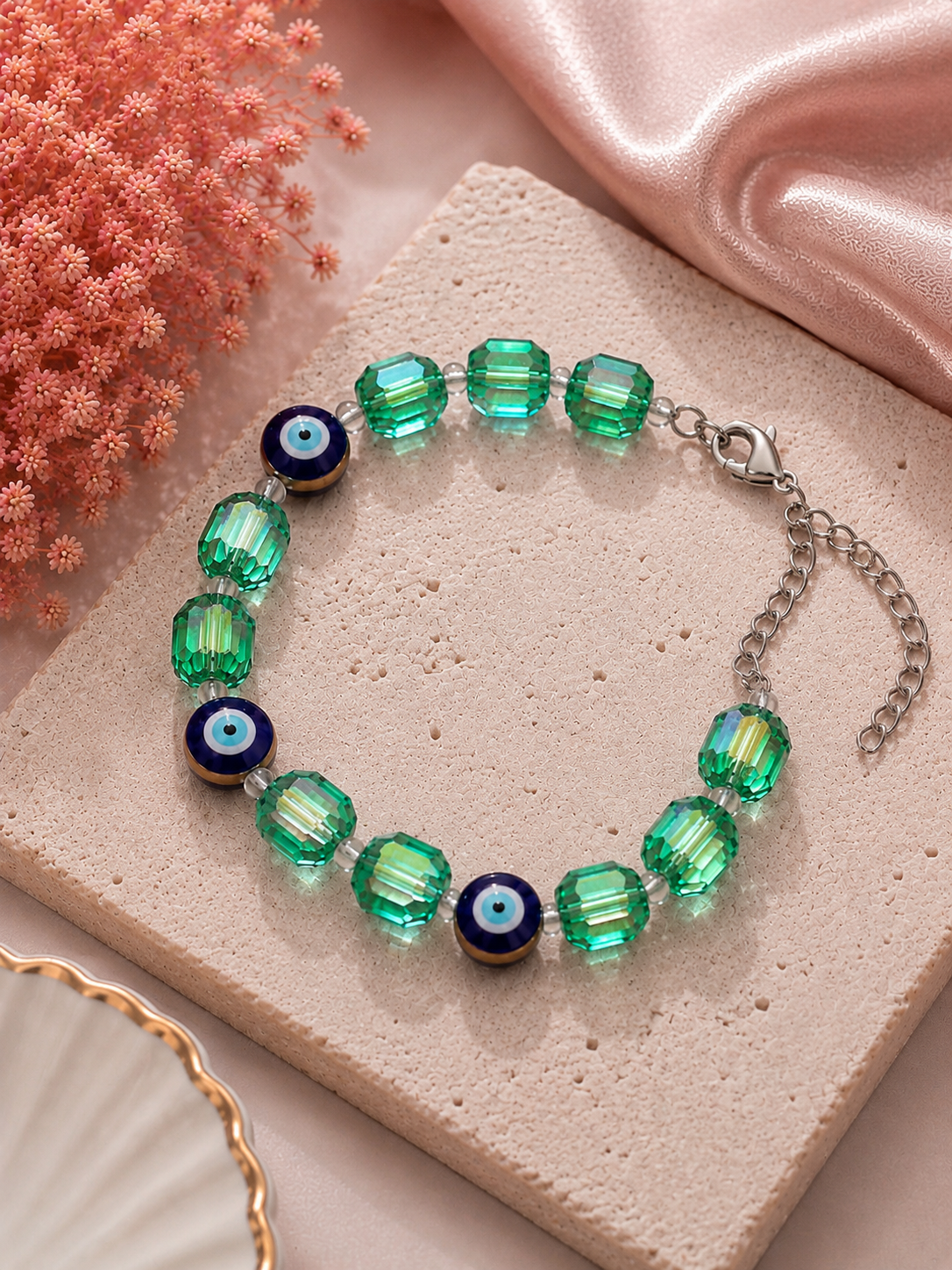 Iridescent green crystal and evil eye bead bracelet