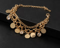 Flat, polished gold-tone circular discs charm bracelet