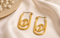 Women's designer-inspired gold monogram link hoop earrings