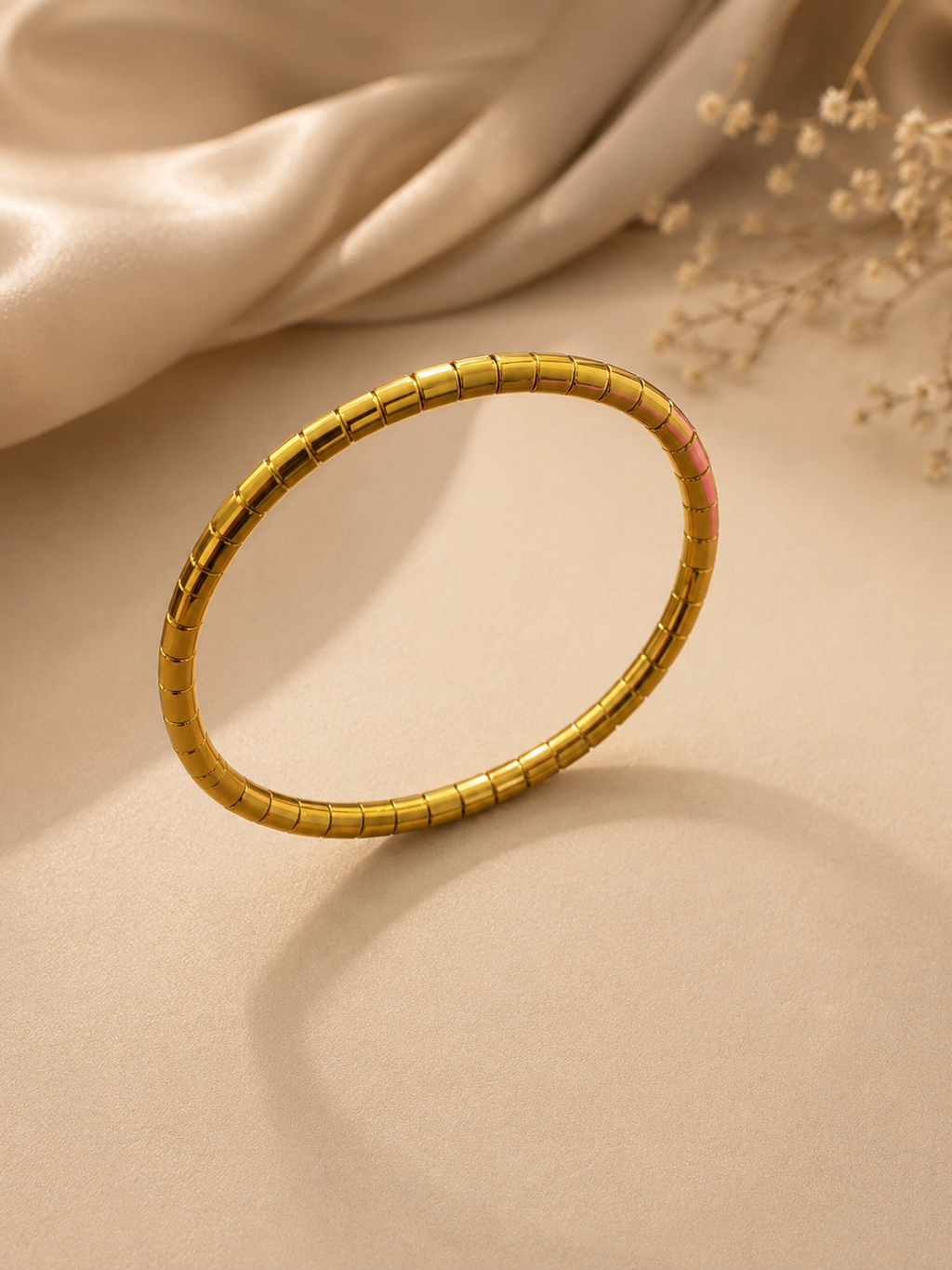 Minimalist gold-toned segmented kada bracelet