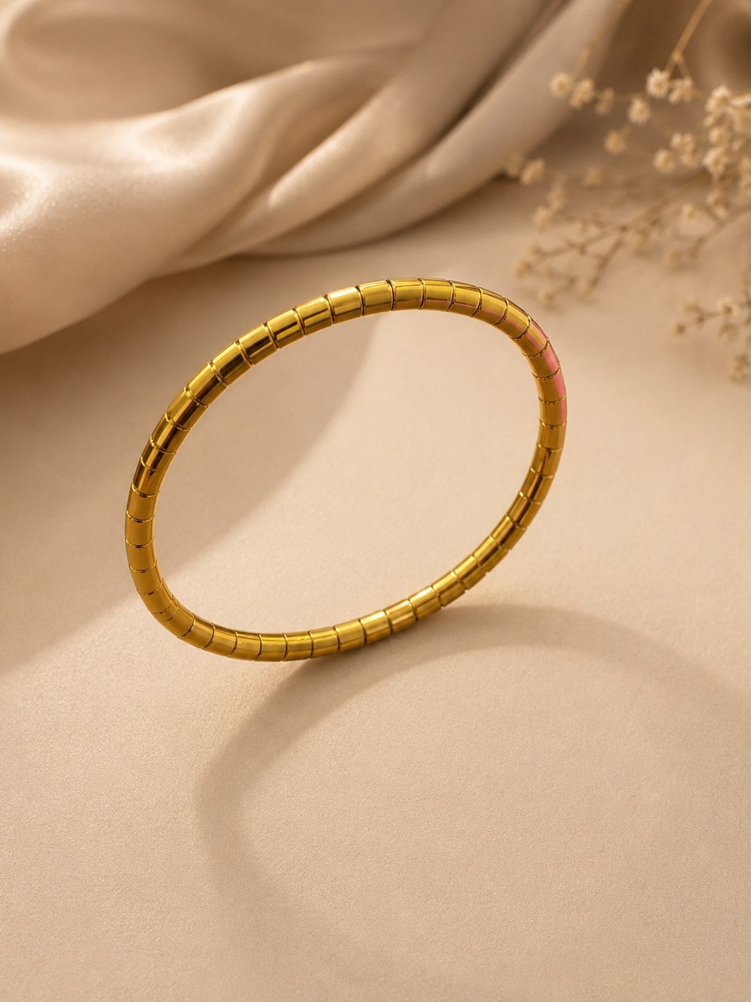 Minimalist gold-toned segmented kada bracelet