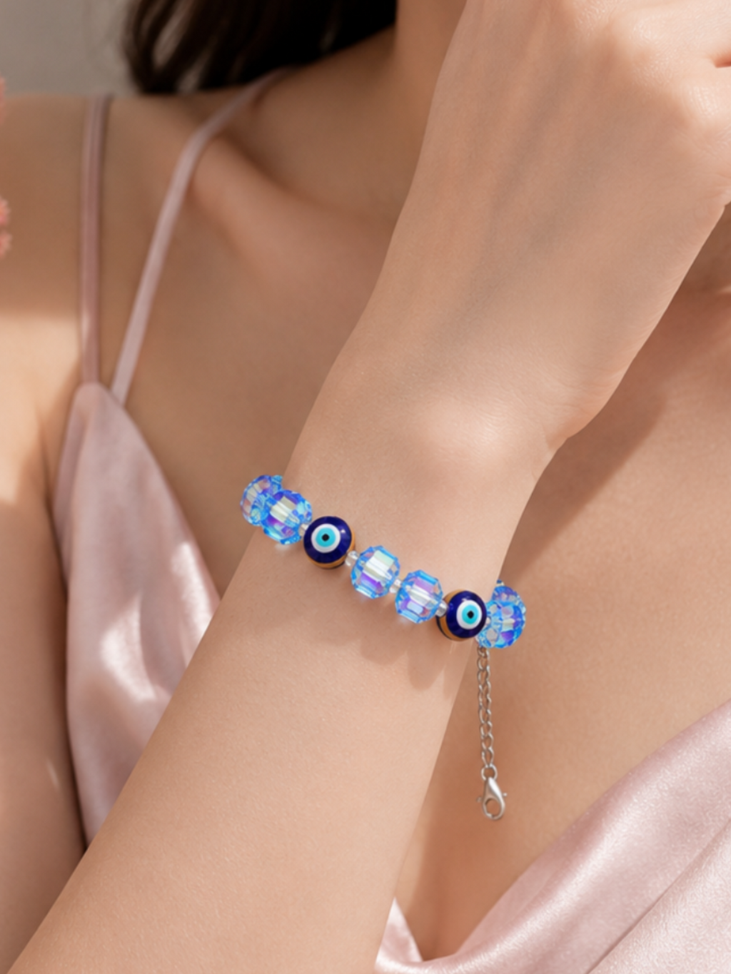 Iridescent light blue crystal and evil eye bead bracelet