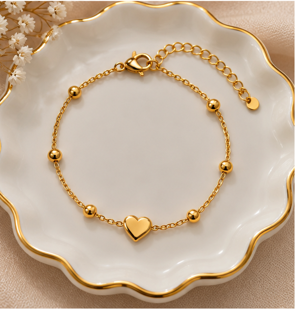 Heart satellite station charm bracelet