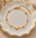 Heart satellite station charm bracelet