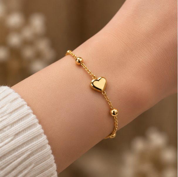 Heart satellite station charm bracelet