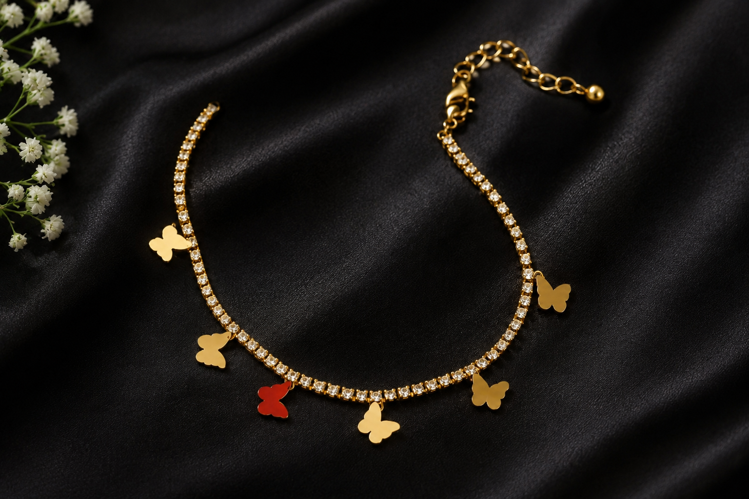 Whimsical gold-plated butterfly tennis charm bracelet