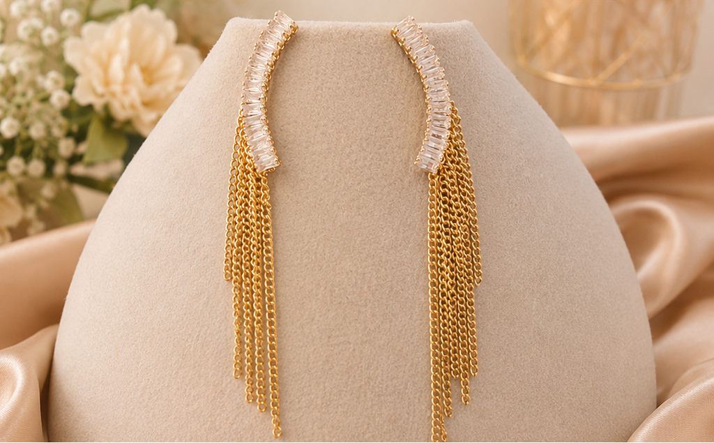 Women's gold crystal ear climber chain tassel drop earrings.