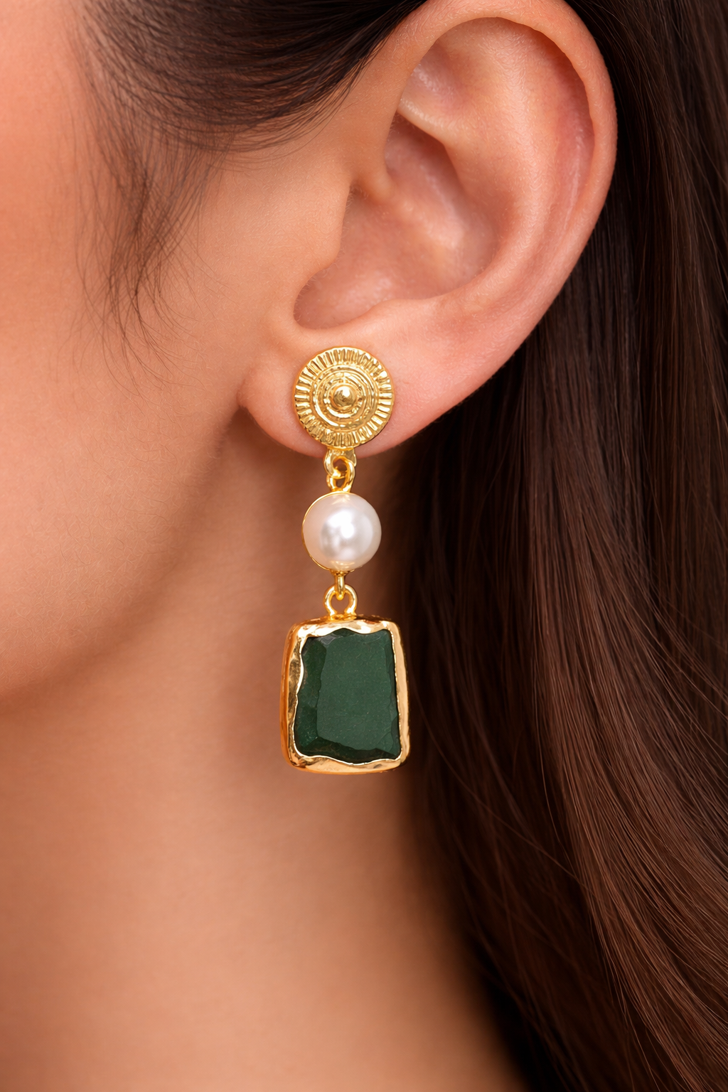 Brass pearl earring with uncut green stone